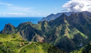 a scenic view of the mountains and ocean